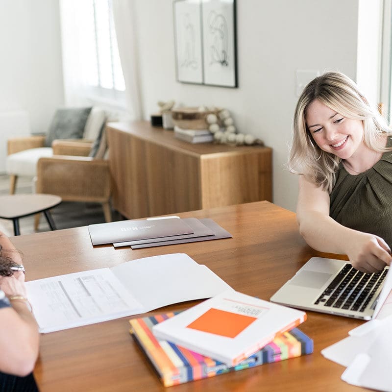 Madison Doody, the Client Success Manager at Don Creative Group working with a lady