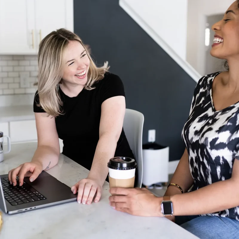 Marketing specialist speaking to a happy client after a successful campaign with brand partners